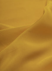 Pure Crepe Amber Yellow Color Plain Fabric.