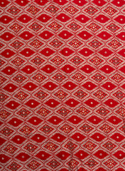 Modal Chanderi Red Color Ikat Screen Print Fabric With Big Panna Foil.