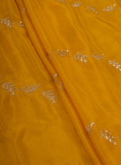 Pure Chinnon Chiffon Amber Yellow Color Zari And Sequins Floral Pattern Embroidery Fabric.