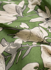 Green Color Floral Bloom: Cotton Flex Discharge Print Fabric with Abstract Magnolia Pattern