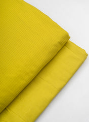 Cotton Kota Lemon Yellow Color Plain Fabric.