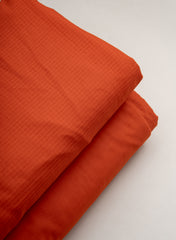 Cotton Kota Red Orange Color Plain Fabric.